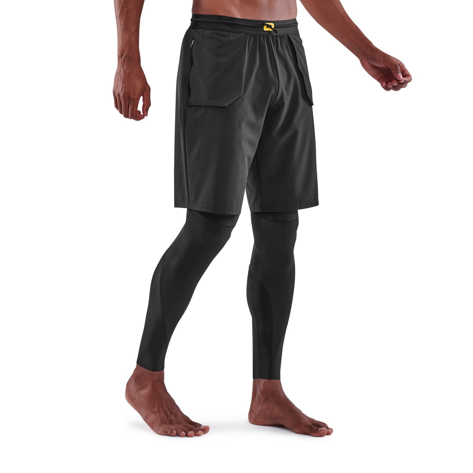 Skins Travel and Recovery Compression Tights in Black with Blue